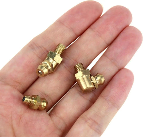Pro Grade Metric Brass Grease Nipple Assortment Kit 15 Pieces M4 Straight 45 Degree 90 Degree Angled Zerk Fittings in hand