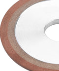 Close-up of Beast Mode Diamond Grinding Wheel For Hard Metals, 125mm disc with 32mm arbor, showing resin edge and metallic center