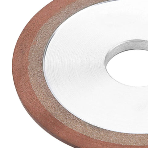 Close-up of Beast Mode Diamond Grinding Wheel For Hard Metals, 125mm disc with 32mm arbor, showing resin edge and metallic center