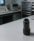 All Plastic 7 Pin Proportional Valve Connectors Featuring Rock Solid Female Plugs For Hydraulic Solenoid Connections And Industrial Machinery Built Super Tough, shown on a workbench.