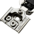 Front close-up of satin-nickel concealed cabinet hinge plate with mounting screws