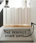 Auto Retractable Stair Gate for Doorways and Stairs, white gate installed at top of stairs, one hand operation, easy install view.