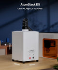 D5 Laser Engraver Air Purifier For P1 5W Mini Smoke Purifier with 3 Layer Fume Extractor on a desk next to laser engraver