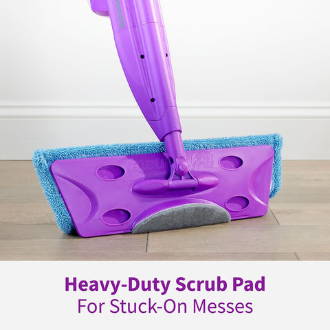 Close-up of Click N Clean Multi Surface Spray Mop with heavy-duty scrub pad showing on wood floor for tough cleaning tasks.