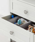 Top Shelf 10 Pack Brushed Satin Nickel Kitchen Cabinet Knobs Solid Heavy Duty Metal Drawer Pulls Rust Proof Hardware on white drawers.