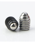 Close-up of two M8 ball spring plungers, one black and one silver, from the 15 Piece M8 Ball Spring Plunger Hex Socket Set Screws Crafted From Premium Stainless And Carbon Steel Tough As Nails Hardware With A Dead Tight Hold Designed For Rock Solid Machine Setup And Garage Diy Upgrades.