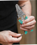 Heavy Duty Insulated Wire Strippers Pro Grade Electrical Pliers in hand, showing crimping and peeling tool design for electricians.