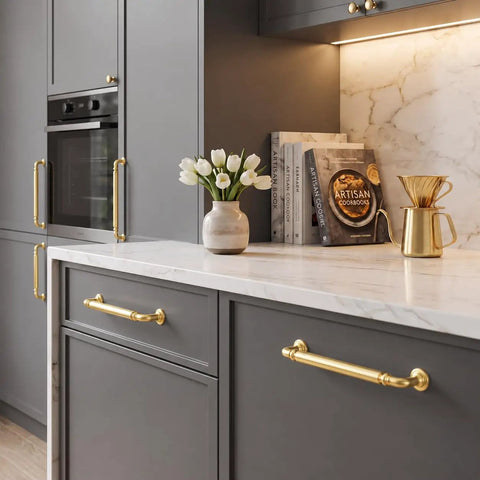 10-Pack Brushed Gold Cabinet Pulls 5-Inch Drawer Handles For Kitchen Digs Top-Shelf Zinc Alloy Hardware on grey cabinetry.