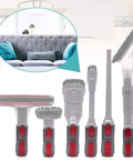 Six vacuum attachments with red buttons, including a brush head, compatible for Dyson V7-V11, shown near a cat on a couch.