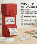 Compact Kids Mini Thermal Printer Featuring Zero Ink Hassle And Instant Screen Preview For Challenge Cards Clue Notes Activity Sheets And Straight Up Game Night Essentials on a wooden table.