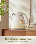 Retro Electric Kettle With Thermometer 1.7 Liter All Stainless Steel 1200 Watt Fast Boil Cordless BPA Free Auto Shut Off With Precise Temperature Reading Pearl White Kitchen Essential For Tea Lovers on table.