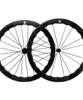 Pair of Carbon Wheelset 45to50CU-25-CC 700C Tubeless Rim Brake for Road Bikes, showing curved black aero rims and thin spokes