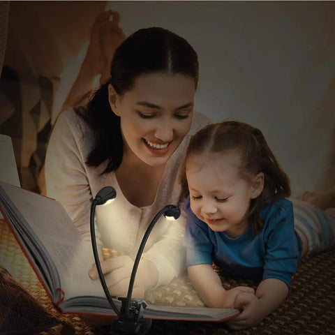Rechargeable 12 LED Warm Clip On Book Light With Dual Goosenecks Bed Reading Lamp used by a woman and child, eye-friendly illumination