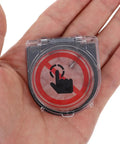 Transparent Push Button Switch Cover For Computers And Elevators held in hand, clear round design with anti-press symbol