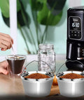 Eco Friendly Reusable Stainless Steel Coffee Filter For 8 To 12 Cup Drip Brewers next to coffee maker and hand stirring coffee