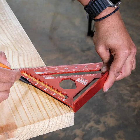 Seven Inch Double Laser Etched Aluminum Rafter Square With Badass Accuracy And No Hassle Multifunctional Carpenter Measuring Layout Tool Featuring Smooth Triangle Ruler For Tight Woodworking Cuts on wood.