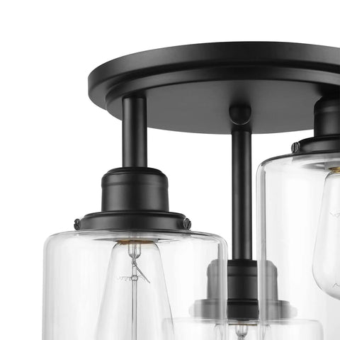 Close-up view of Three Light Industrial Tiered Matte Black Flush Mount Ceiling Light With Clear Glass Shade Dimmable E26 Base