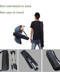 Rugged Multi-Function Equipment Organizer Bag For Music Stands Tripods Mic Stands Camera Gear And Hunting Kit Heavy Duty Water-Resistant Storage Case Travel Tool Kit 22 Inches Long With Adjustable Dividers For A Custom Fit, shown being carried over the shoulder and with tripods.