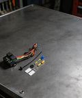 Digital Thermostatic Fan Switch Kit for 12V Motors and EVs Adjustable Temperature Activation 40C to 120C with prewired harness and relay accessories.