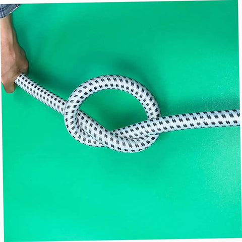 Person holding extended length PVC nylon steam hose tied in a knot showing durability for high temperature garment steamers.