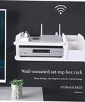 Heavy Duty Wall Mount Router Holder And Cable Management Rack With No Drill Quick Install And Thick Plate Storage Shelf For Your Home Office Setup Plus Sweet Ventilation And Solid Grip, white wall-mounted shelf with router.