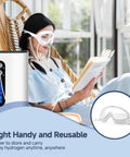 Woman reading while wearing 3-In-1 Hydrogen Inhalation Goggles For Eye Heat, Massage And H2 Care, in a relaxing setting.