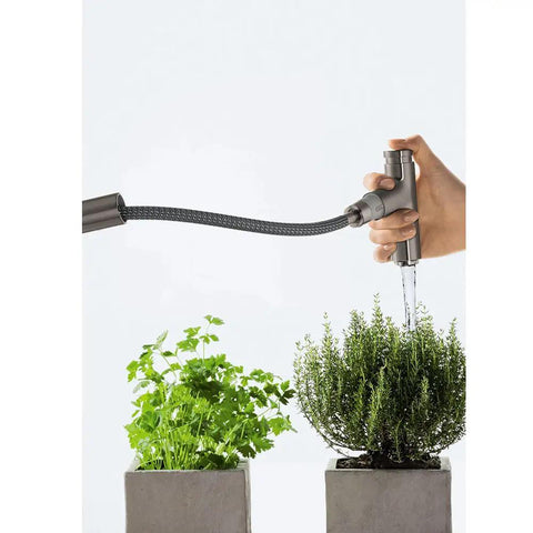 Pull-Down Kitchen Faucet Hose In Chrome Small Size watering plants, showing flexible design and durable brass core, easy install