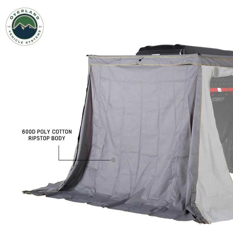 Hella Rugged Partner Side Awning Wall To Keep Your Trail Campout Rig Shade Covered Features Rapid Velcro Clips Storm Resistant Ripstop Canvas Screens And Heavy Duty Weather Shields In Granite Gray With Lime Green Accents, showcasing 600D poly cotton ripstop body.