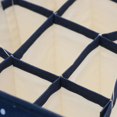 Waterproof Foldable Oxford Cloth Drawer Organizer With Sturdy Grid Dividers For Socks Underwear And Scarves showing inner compartments.