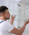 Man installing Heavy Duty 6 Pack 36 Inch Shelf Pilaster Tracks With 36 Shelf Clips Set For Adjustable Wall Shelving System