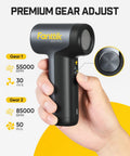 Person holding B10 Pro Electric Air Duster Cordless Desktop Blower With 110000 RPM Brushless Motor MegaBoost One Tap Booster