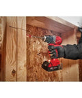 18V Cordless Compact Brushless Drill Driver Kit With Two Batteries Charger And Contractor Bag Heavy Duty Half Inch Chuck Tool For Tight Spaces Job Site Badass Power Control being used to drill into wood.