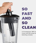 Hand holding the lid of Beast Pro Grade Countertop Blender With 3 HP 1800W Motor 64 Oz Jar Stainless Steel Blades