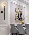 Elegant dining room featuring Industrial Gold And Black 1 Light Wall Sconce With Long Arm And Globe Glass Shade for modern space