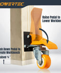 Heavy Duty Workbench Caster Kit With Retractable Stepdown Swivel Wheels Set Of Four Two Point Five Inch TPR Casters 600 Pound Rock Solid Shop Furniture Gear For Hassle Free Rolling showing pedal mechanism on caster.