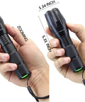 Man holding Two Pack Ultra Bright 1000 Lumen LED Flashlights, Tactical Zoomable Beams, showing 5.31 inch size