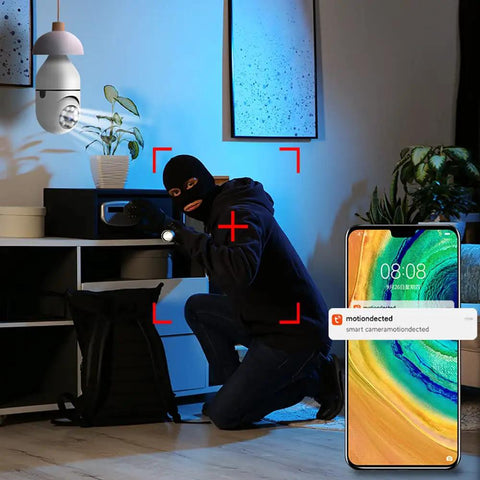 1080P Light Bulb Camera with Night Vision detecting motion of intruder, alert visible on smartphone screen, home surveillance setup