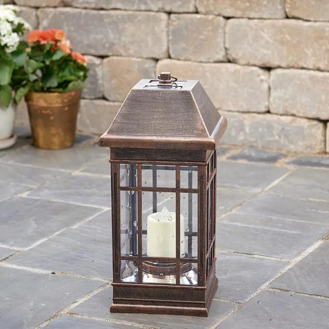 San Rafael II Solar Mission Lantern With Dual High Performance Warm White LEDs And Amber Pillar Accent on patio