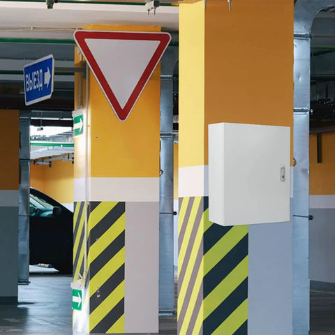 Built To Last Cold Rolled Steel Electrical Enclosure Box 20X16X8 Inch mounted in a brightly colored parking garage.