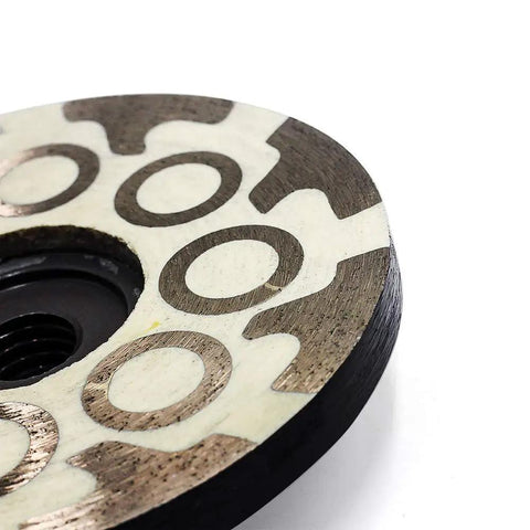 Heavy Duty Resin Bond Diamond Cup Wheel Fine Grit Smooth Ride For Crushing Slab And Prepping Tile Built Tough As Nails close-up view.