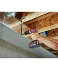 Heavy Duty Compact Hammer Drill Driver With All Metal Chuck And Gears Delivers Hella Tough 500 Inch Pounds Torque For Concrete And Wood Jobsites Worldwide For Pro Contractors in action drilling into metal ducting.