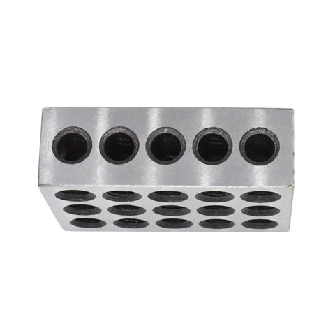 Aluminum machinist jig block with 23 through holes; top face shows five holes, side holes visible.