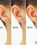 14K White Gold Ball Stud Earrings With Secure Screw Backs, Sleek 4Mm Dainty Hollow Spheres For Everyday Wear, Classic Minimal Jewelry That Elevates Casual Or Dressy Looks, Available In 3Mm To 8Mm Sizes, shown on ear in 3mm, 4mm, 5mm