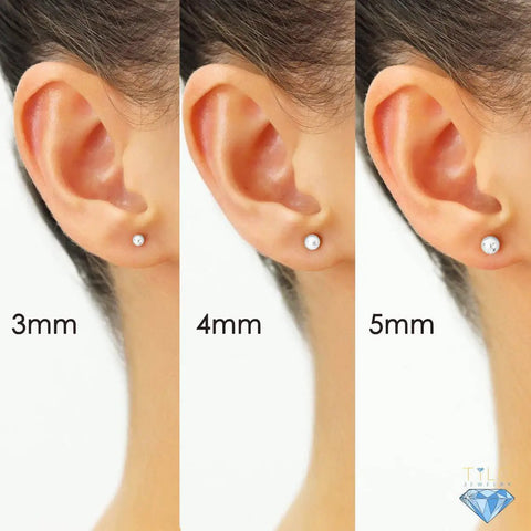 14K White Gold Ball Stud Earrings With Secure Screw Backs, Sleek 4Mm Dainty Hollow Spheres For Everyday Wear, Classic Minimal Jewelry That Elevates Casual Or Dressy Looks, Available In 3Mm To 8Mm Sizes, shown on ear in 3mm, 4mm, 5mm