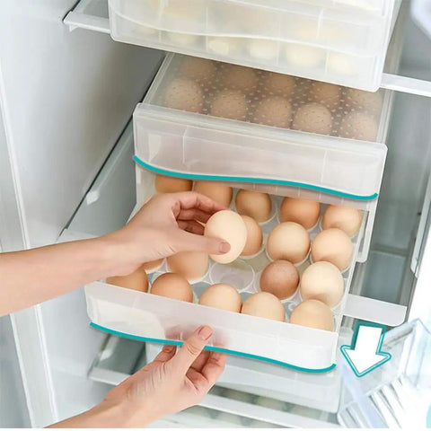 Person placing egg in Fridge Egg Holder With 60 Grid Storage, 2 Layer Drawer Style Egg Carrier Box For Kitchen, BPA Free Clear PP
