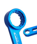 Close-up of Six In One Bicycle Bottom Bracket Tool for Hollowtech II and PF30, showing 12 and 16 notch wrench detail in blue aluminum.