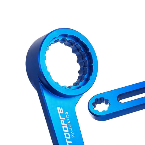 Close-up of Six In One Bicycle Bottom Bracket Tool for Hollowtech II and PF30, showing 12 and 16 notch wrench detail in blue aluminum.