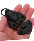 Hand holding metal duckbill latch from Retro Toggle Latch Set 8 Pcs Metal Duckbilled Hasp Locks For Vintage Suitcases Luggage Buckle Kit