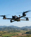X2812 900KV Brushless FPV Drone Motors for 7 and 8 inch quad frames flying in open landscape, showcasing efficient performance.