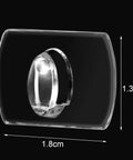 Close-up of a Mini Clear Decorating Hook Clip with Adhesive Tape, 60 Pack for String Lights and Holiday Decor, 1.8cm by 1.3cm